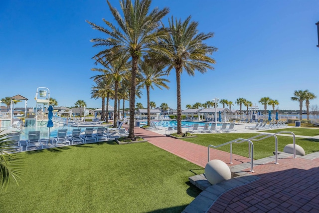 98 Windermere Way, Saint Augustine, FL 32095 - surrounding community with a pool and a lawn