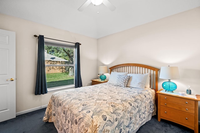 carpeted bedroom featuring ceiling fan