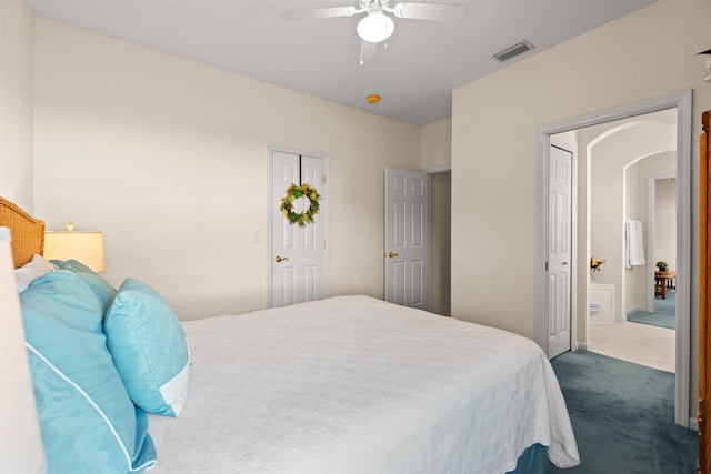 carpeted bedroom with ceiling fan