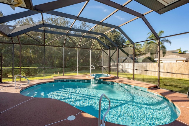 view of pool featuring an in ground hot tub, a lanai, and a patio