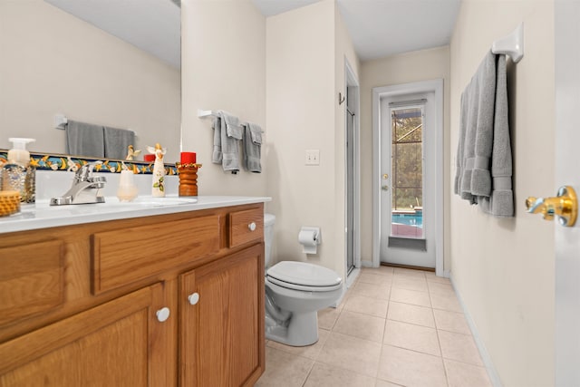 bathroom with vanity, an enclosed shower, tile patterned floors, and toilet