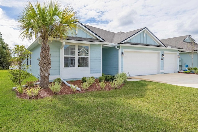 ranch-style home featuring an attached garage, driveway, a front lawn, and board and batten siding