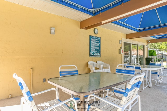 view of patio with outdoor dining area