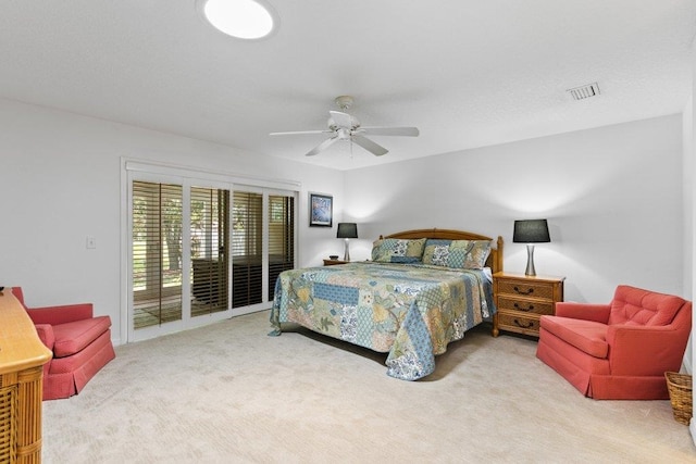 bedroom featuring carpet floors, ceiling fan, access to exterior, and visible vents