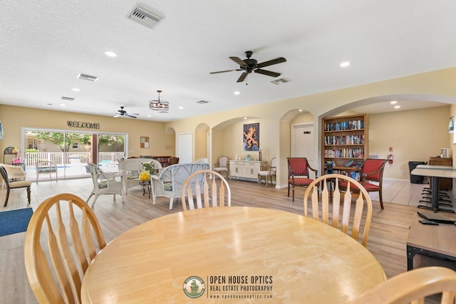 dining area with a ceiling fan, visible vents, and recessed lighting