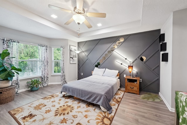 1337 Nochaway Dr, Saint Augustine, FL 32092 - bedroom featuring a raised ceiling, baseboards, and wood finished floors