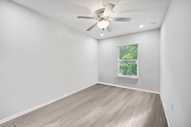 1337 Nochaway Dr, Saint Augustine, FL 32092 - unfurnished room with wood finished floors, baseboards, and a ceiling fan