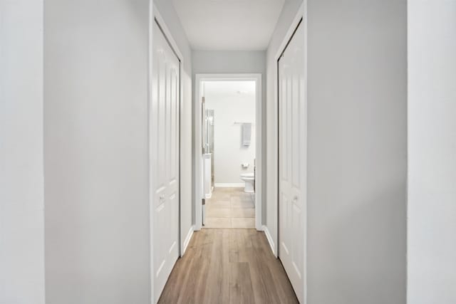 1337 Nochaway Dr, Saint Augustine, FL 32092 - hallway with baseboards and wood finished floors