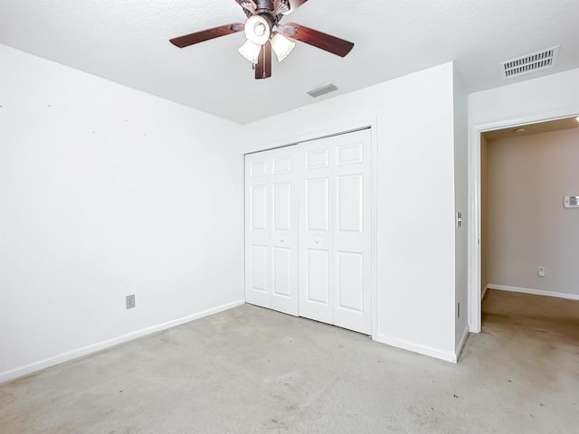 unfurnished bedroom with a closet, ceiling fan, and light colored carpet