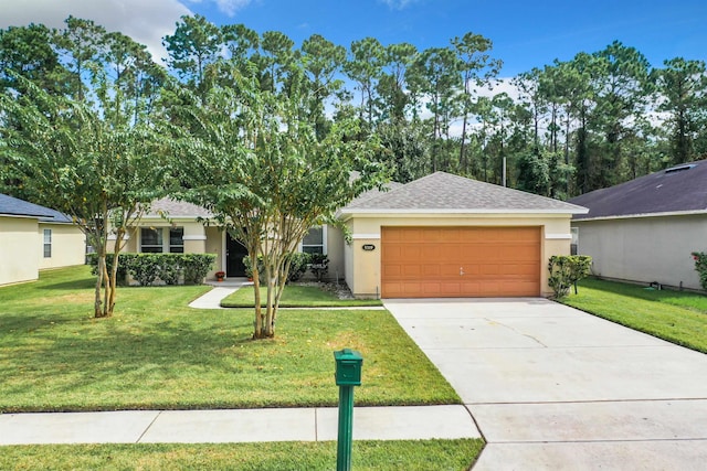 ranch-style home featuring a garage and a front lawn