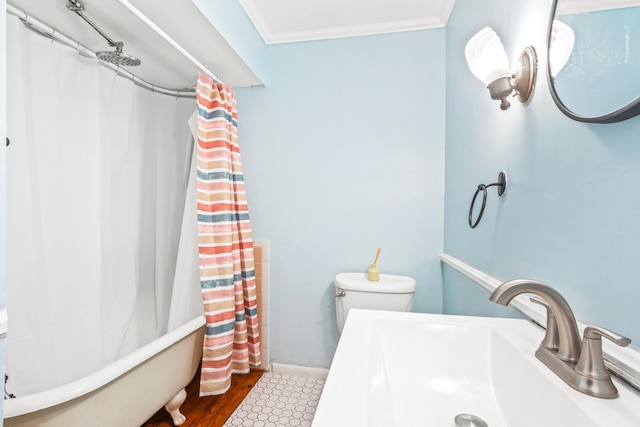 26 Ponce De Leon Ave, Saint Augustine, FL 32080 - bathroom with ornamental molding, shower / bathtub combination with curtain, and wood finished floors