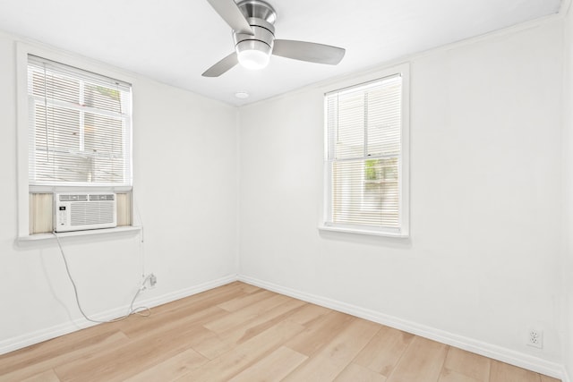 26 Ponce De Leon Ave, Saint Augustine, FL 32080 - unfurnished room with light wood finished floors, healthy amount of natural light, ceiling fan, cooling unit, and crown molding