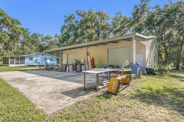 garage with a lawn