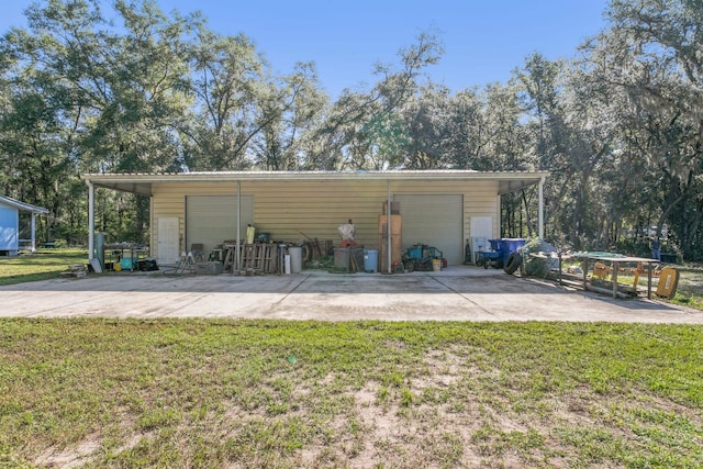 garage with a yard