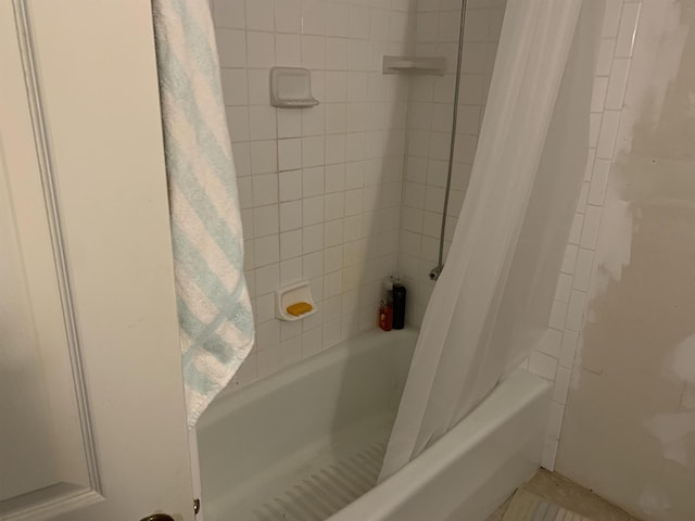 bathroom featuring shower / bath combination with curtain