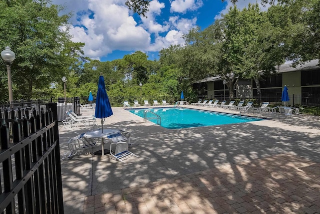 view of pool with a patio area