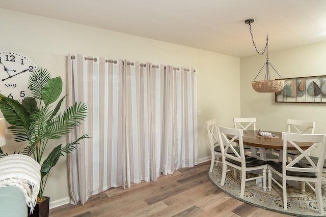 dining room featuring hardwood / wood-style flooring