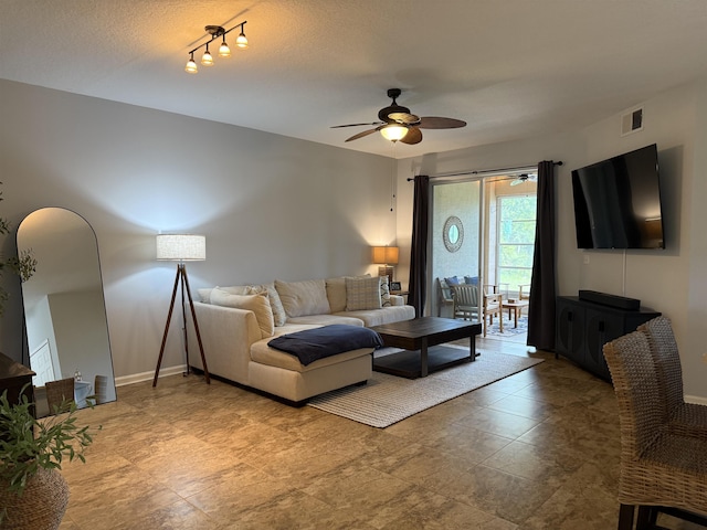 1804 Prestwick Pl Unit 1804, Saint Augustine, FL 32086 - living area with ceiling fan, visible vents, baseboards, and rail lighting