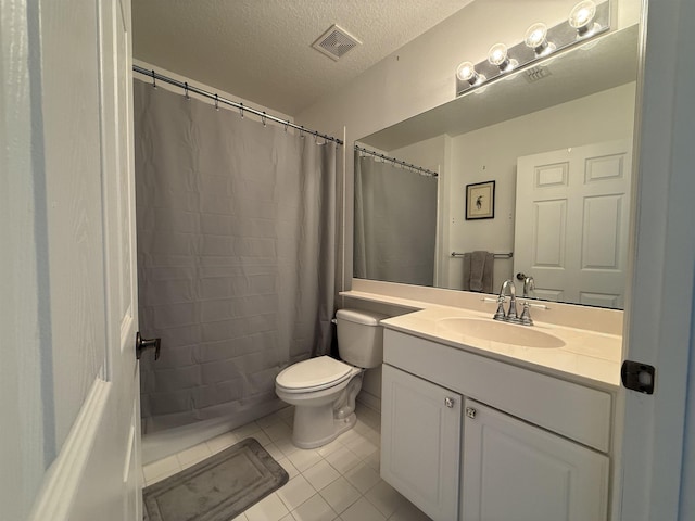 1804 Prestwick Pl Unit 1804, Saint Augustine, FL 32086 - bathroom with vanity, toilet, a textured ceiling, tile patterned floors, and visible vents