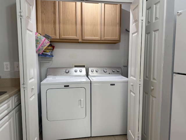 1804 Prestwick Pl Unit 1804, Saint Augustine, FL 32086 - laundry room featuring cabinet space and washing machine and clothes dryer