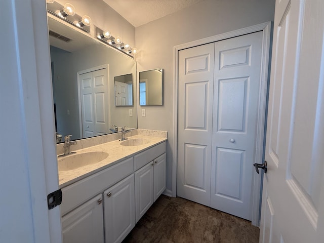 1804 Prestwick Pl Unit 1804, Saint Augustine, FL 32086 - full bathroom with double vanity, visible vents, and a sink