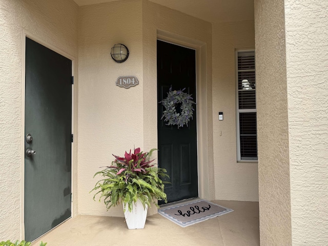 1804 Prestwick Pl Unit 1804, Saint Augustine, FL 32086 - view of exterior entry featuring stucco siding
