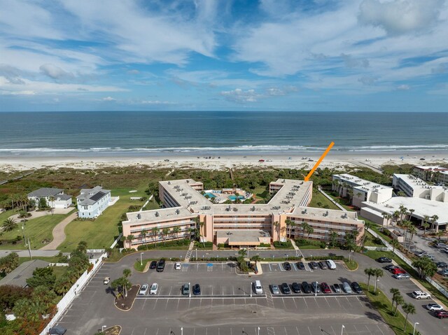 aerial view with a beach view and a water view