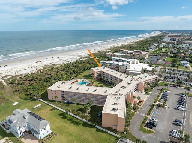 aerial view featuring a water view and a beach view