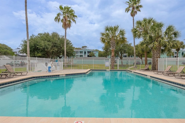 view of swimming pool with a patio