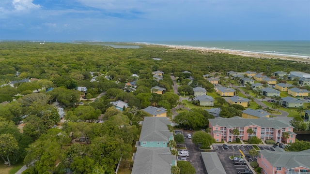 bird's eye view with a view of the beach and a water view