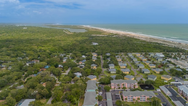 bird's eye view featuring a beach view and a water view