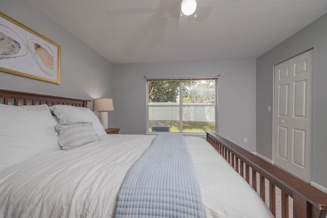 bedroom featuring access to outside and ceiling fan