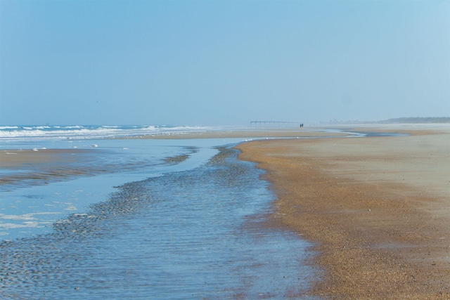 property view of water with a beach view