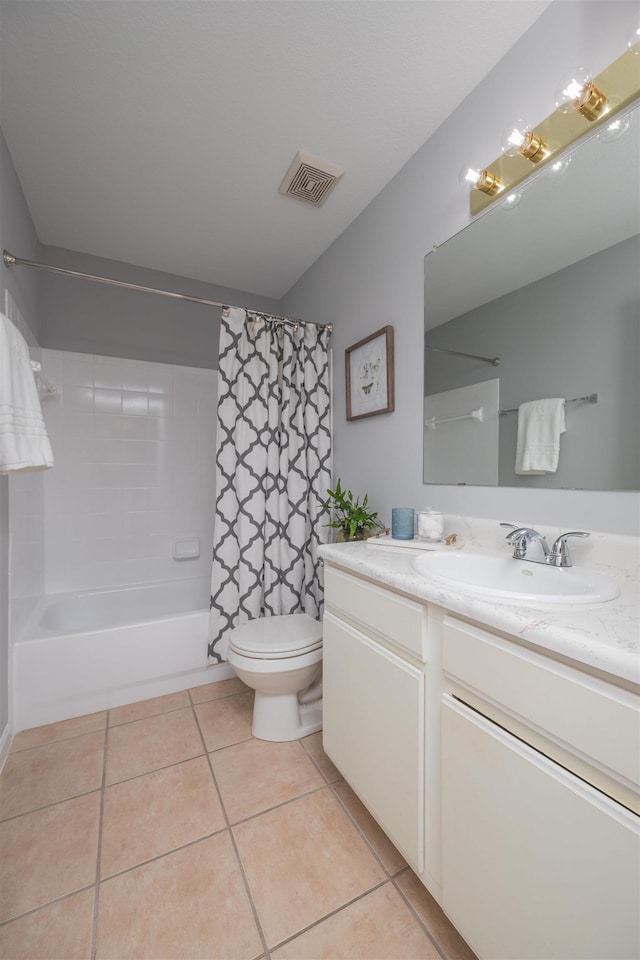 full bathroom featuring vanity, shower / tub combo, tile patterned floors, and toilet