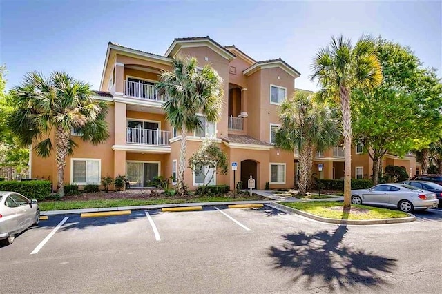 520 Florida Club Blvd Unit 101, Saint Augustine, FL 32084 - view of property with uncovered parking