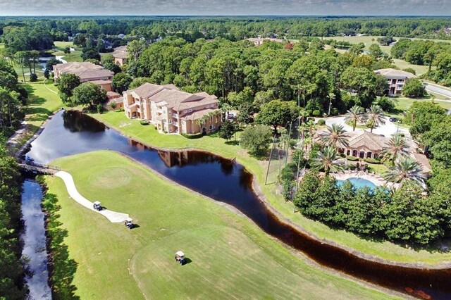 520 Florida Club Blvd Unit 101, Saint Augustine, FL 32084 - birds eye view of property featuring a water view and a wooded view