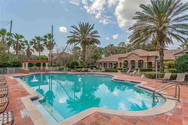 520 Florida Club Blvd Unit 101, Saint Augustine, FL 32084 - community pool with a patio and fence