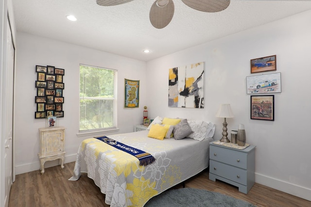 1300 Paradise Pond Rd, Saint Augustine, FL 32092 - bedroom featuring wood finished floors, baseboards, recessed lighting, and a textured ceiling