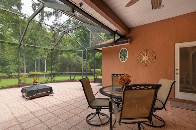 1300 Paradise Pond Rd, Saint Augustine, FL 32092 - view of patio with ceiling fan, glass enclosure, and outdoor dining space