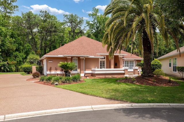 1300 Paradise Pond Rd, Saint Augustine, FL 32092 - ranch-style home featuring stucco siding and a front yard