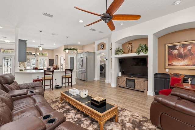 1300 Paradise Pond Rd, Saint Augustine, FL 32092 - living room with recessed lighting, a ceiling fan, light wood finished floors, and washer / dryer
