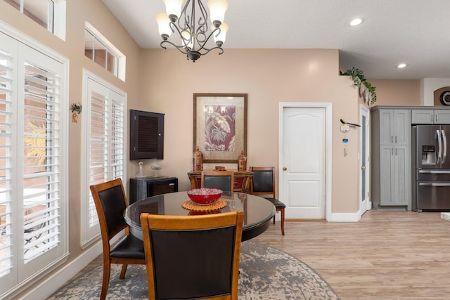 1300 Paradise Pond Rd, Saint Augustine, FL 32092 - dining room featuring a chandelier, light wood-style flooring, baseboards, and recessed lighting