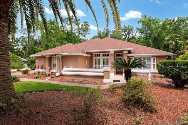 1300 Paradise Pond Rd, Saint Augustine, FL 32092 - back of house featuring stucco siding