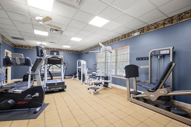1300 Paradise Pond Rd, Saint Augustine, FL 32092 - exercise room with a drop ceiling, ceiling fan, and baseboards