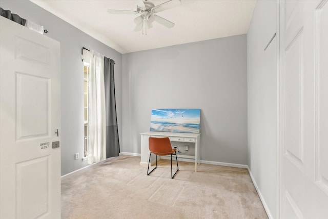 office area with ceiling fan and light colored carpet