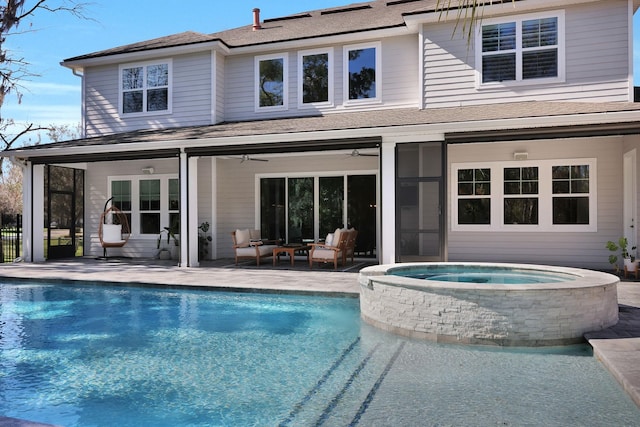 200 Manuel Ct, Saint Augustine, FL 32095 - back of property featuring a ceiling fan, an in ground hot tub, a patio area, and an outdoor pool