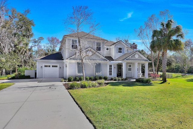 200 Manuel Ct, Saint Augustine, FL 32095 - view of front facade featuring driveway, an attached garage, and a front lawn
