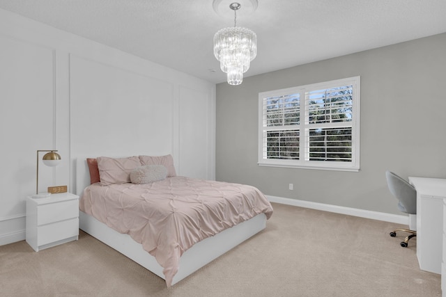 200 Manuel Ct, Saint Augustine, FL 32095 - carpeted bedroom featuring an inviting chandelier and baseboards