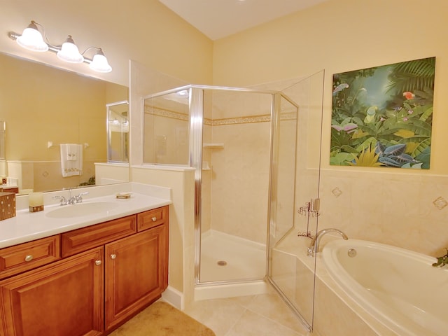 bathroom with tile patterned flooring, vanity, and independent shower and bath