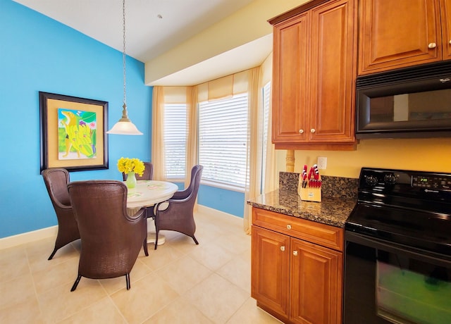 dining area with light tile patterned floors